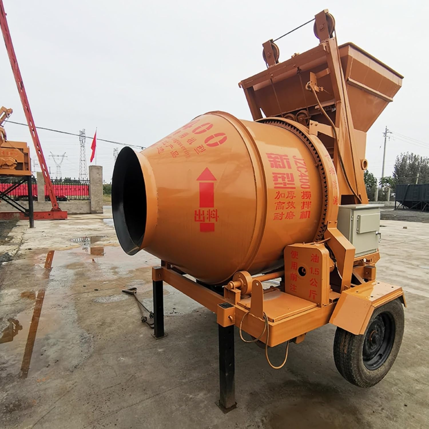 Mobile Concrete Mixers with Drum and Discharge Chute for Ready-Mix Concrete Applications and Mixing Materials on Industrial Sites, Construction Projects and in Remote Locations