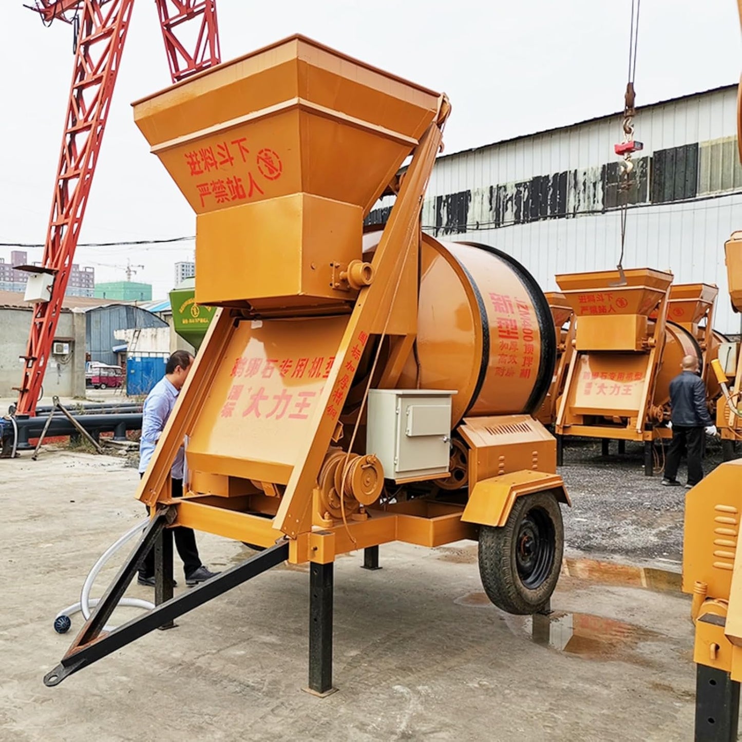 Mobile Concrete Mixers with Drum and Discharge Chute for Ready-Mix Concrete Applications and Mixing Materials on Industrial Sites, Construction Projects and in Remote Locations