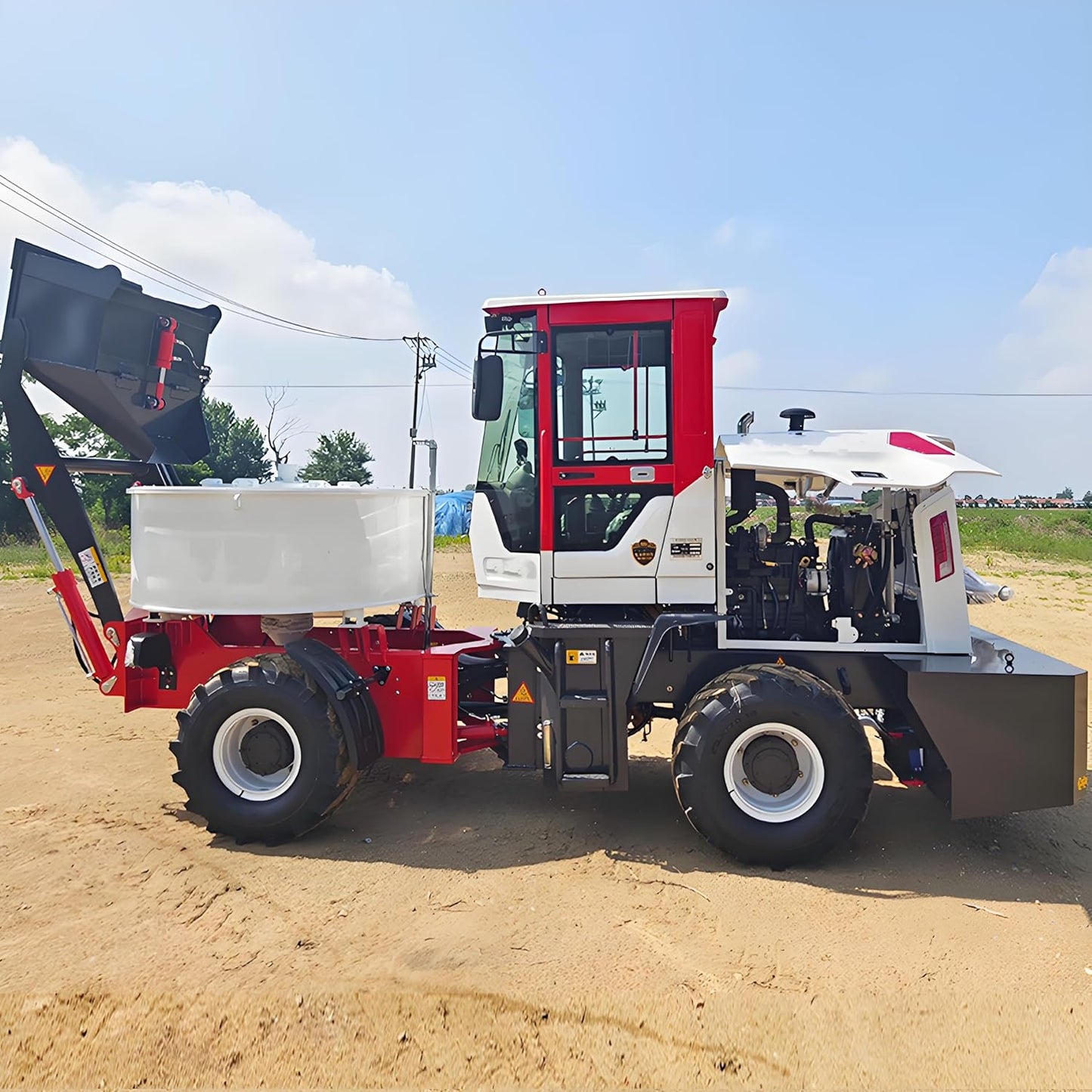 Compact Self Loading Concrete Mixer Truck – Mobile 4X4 Cement Mixer with Front Loading Bucket, Hydraulic Mixing Drum & Easy One-Person Operation for On-Site Construction Projects